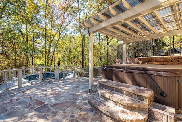 view of patio / terrace featuring a hot tub