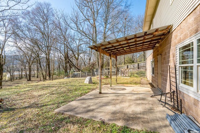 view of yard with a fenced backyard and a patio