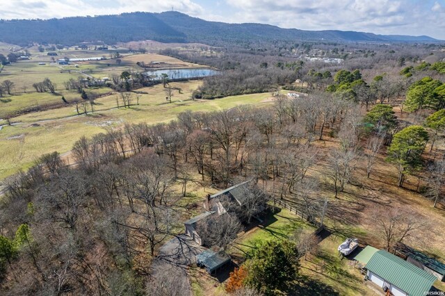 drone / aerial view with a rural view and a water and mountain view