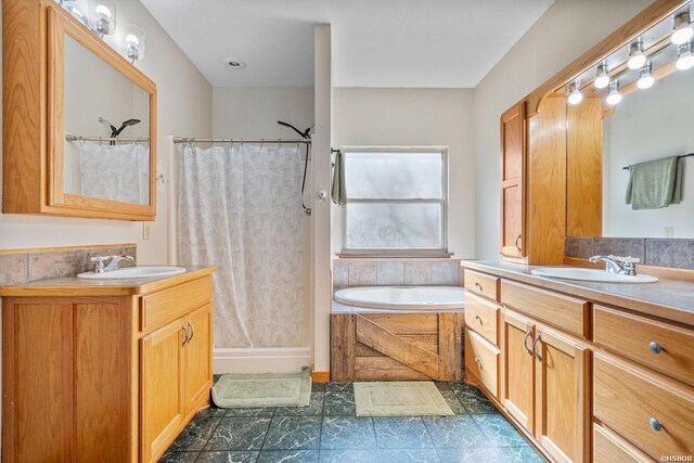 full bathroom with vanity and a shower with shower curtain