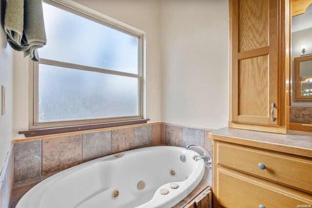 bathroom with a jetted tub