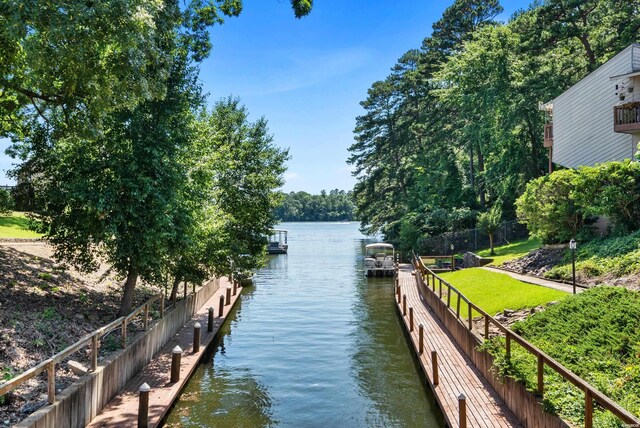 dock area featuring a water view