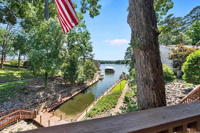 property view of water with a dock