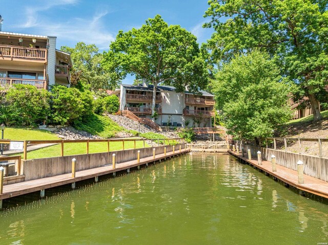 dock area featuring a water view