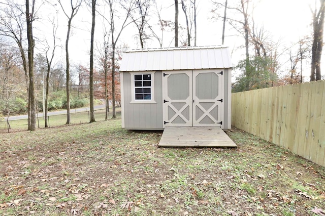 view of shed featuring a fenced backyard