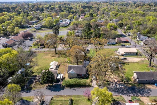 drone / aerial view with a view of trees