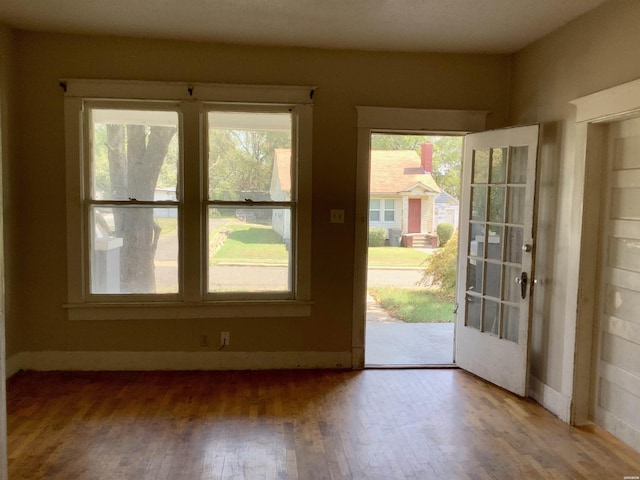 doorway featuring wood finished floors