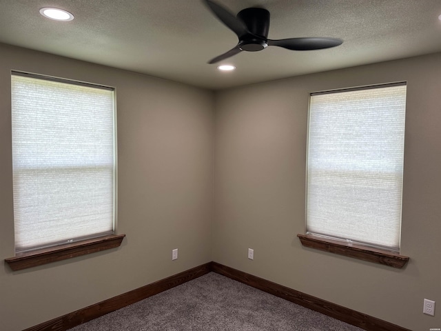 324 Quapaw Rd, Bismarck, AR 71929 - unfurnished room featuring dark carpet, ceiling fan, recessed lighting, and a textured ceiling