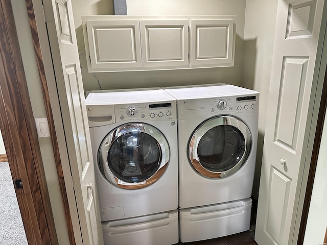 324 Quapaw Rd, Bismarck, AR 71929 - washroom with cabinet space and separate washer and dryer