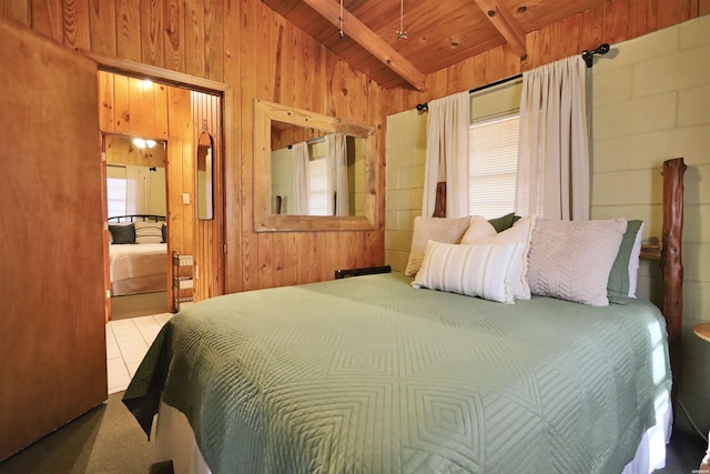 bedroom with vaulted ceiling with beams, wooden ceiling, and wooden walls