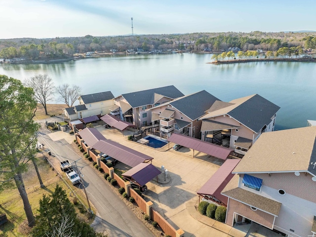 aerial view featuring a water view and a residential view