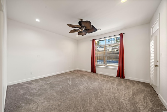 empty room with visible vents, baseboards, ceiling fan, carpet, and recessed lighting