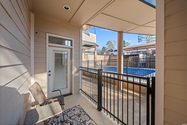 view of patio / terrace featuring fence and a fenced in pool