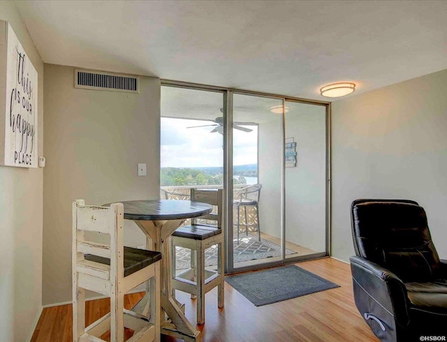 740 Weston Rd Unit A-706, Hot Springs, AR 71913 - office space featuring expansive windows, ceiling fan, and wood finished floors