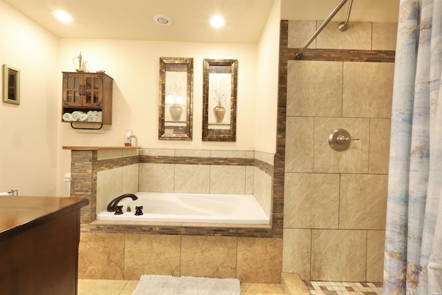 bathroom featuring recessed lighting, a tile shower, vanity, and a bath