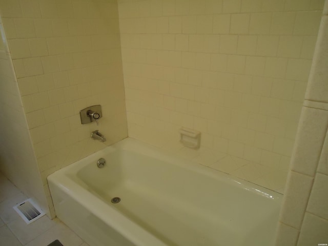 full bath with tile patterned flooring, bathtub / shower combination, and visible vents