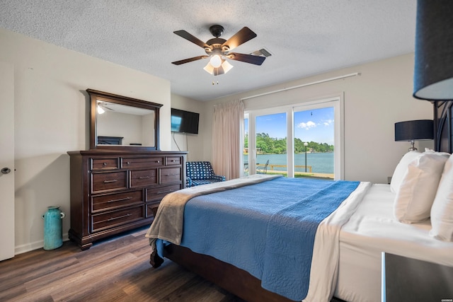 5371 Central Ave Unit 6D, Hot Springs, AR 71913 - bedroom featuring wood finished floors, a textured ceiling, access to outside, a ceiling fan, and baseboards