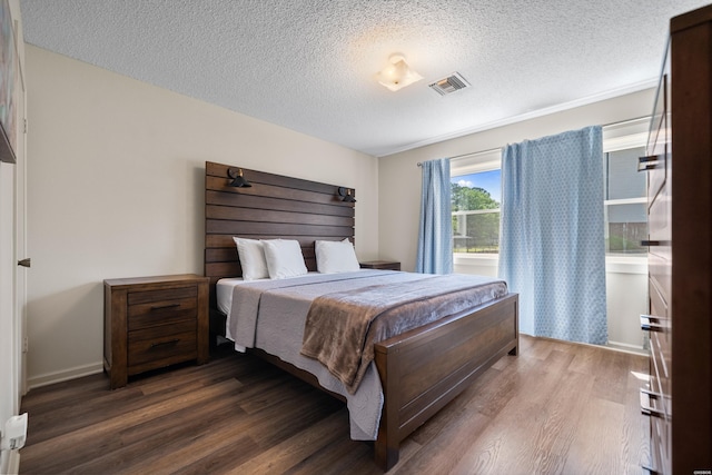 5371 Central Ave Unit 6D, Hot Springs, AR 71913 - bedroom with wood finished floors and a textured ceiling