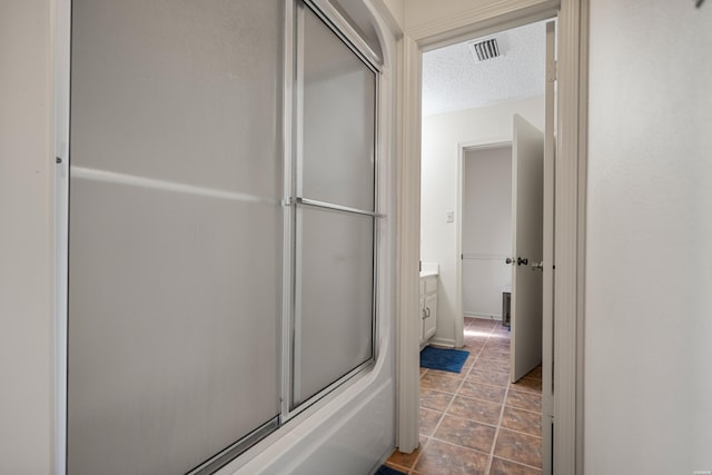 5371 Central Ave Unit 6D, Hot Springs, AR 71913 - bathroom with vanity and a textured ceiling
