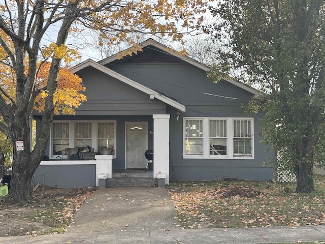 bungalow featuring covered porch