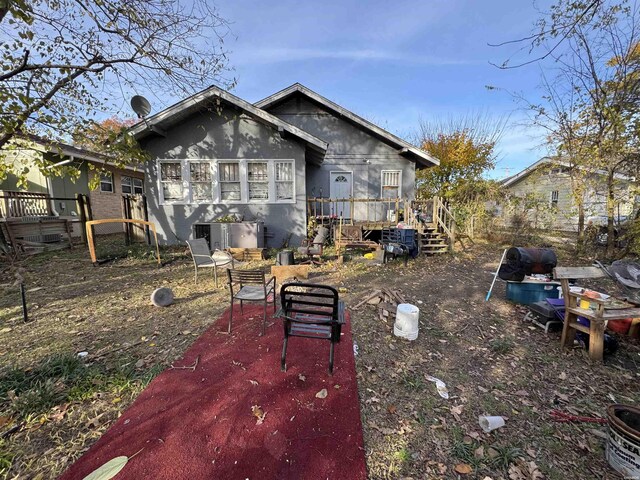 view of front of property with a patio area and stucco siding