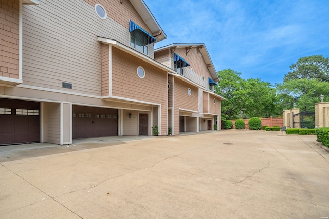 244 Bayou Pt Unit 401-B, Hot Springs, AR 71913 - view of home's exterior featuring driveway, a garage, and fence