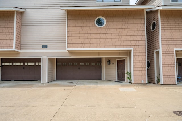 244 Bayou Pt Unit 401-B, Hot Springs, AR 71913 - view of front of house featuring concrete driveway and a garage
