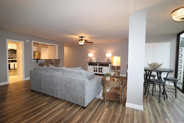 740 Weston Rd Unit 102, Hot Springs, AR 71913 - living room featuring wood finished floors, baseboards, and ceiling fan