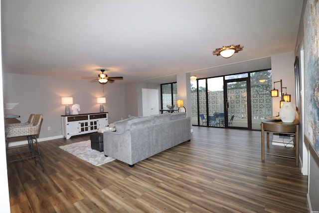 740 Weston Rd Unit 102, Hot Springs, AR 71913 - living area with baseboards, a ceiling fan, and dark wood finished floors