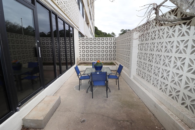 740 Weston Rd Unit 102, Hot Springs, AR 71913 - view of patio with fence and outdoor dining space