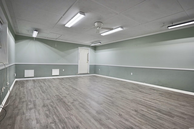 221 Perry St, Glenwood, AR 71943 - empty room featuring baseboards, attic access, ceiling fan, and wood finished floors