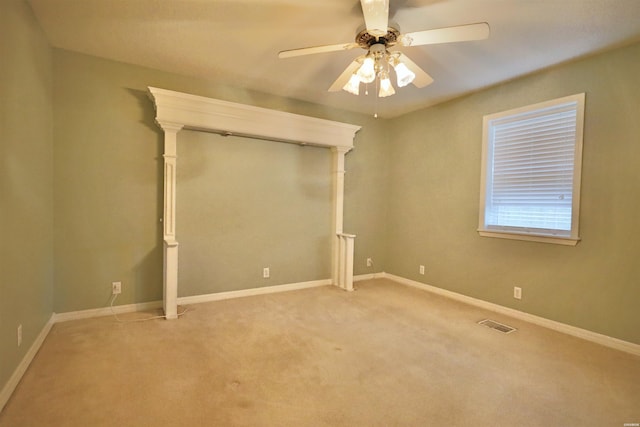 221 Perry St, Glenwood, AR 71943 - unfurnished bedroom with carpet floors, baseboards, ceiling fan, and visible vents