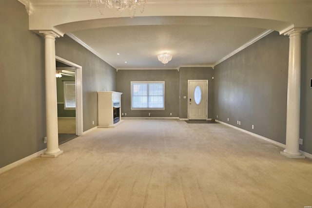 221 Perry St, Glenwood, AR 71943 - unfurnished living room with baseboards, decorative columns, crown molding, and a fireplace with raised hearth