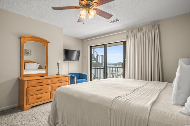 5371 Central Ave Unit 5H, Hot Springs, AR 71913 - bedroom with access to exterior, light carpet, a textured ceiling, and ceiling fan