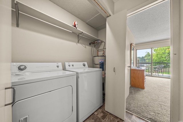 5371 Central Ave Unit 5H, Hot Springs, AR 71913 - laundry area featuring washer and clothes dryer, electric water heater, and a textured ceiling