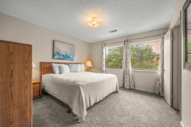 5371 Central Ave Unit 5H, Hot Springs, AR 71913 - carpeted bedroom with a textured ceiling and baseboards