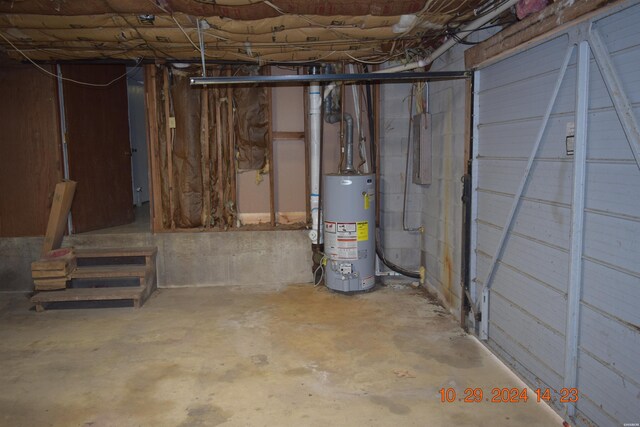 unfinished basement with gas water heater