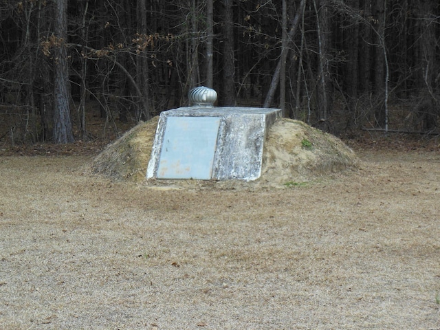 view of entry to storm shelter