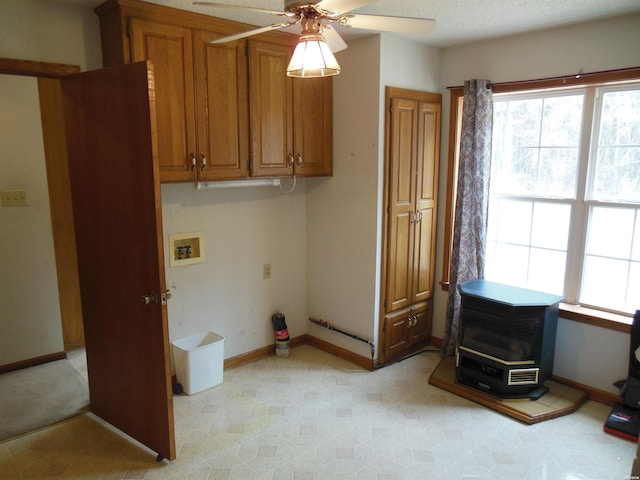 clothes washing area featuring light floors, hookup for a washing machine, ceiling fan, laundry area, and baseboards