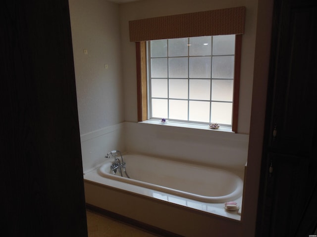 full bathroom with a garden tub