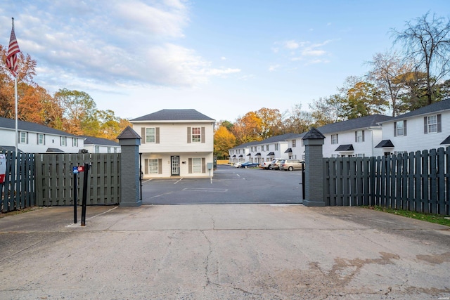 view of street featuring a residential view and driveway