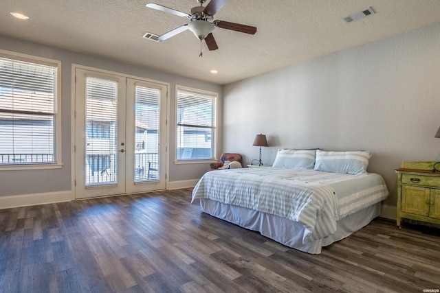 789 Buena Vista Rd, Hot Springs, AR 71913 - bedroom featuring access to exterior, multiple windows, visible vents, and dark wood-style flooring