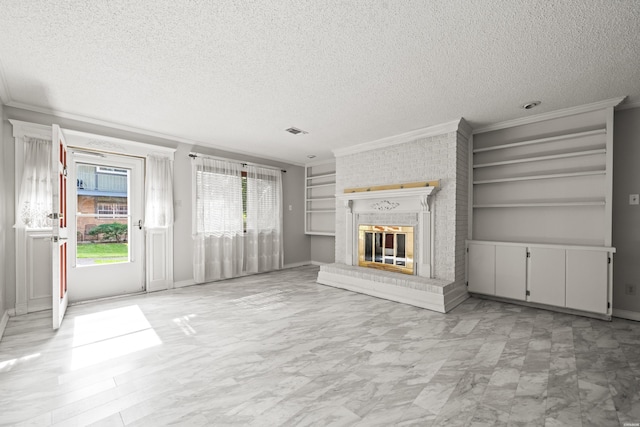 201 Audubon St Unit 1003, Hot Springs, AR 71913 - unfurnished living room with ornamental molding, a textured ceiling, built in features, a brick fireplace, and light marble finish floors
