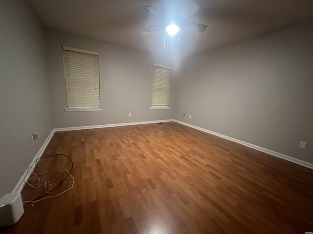 22 Irish Rose Cir, Alexander, AR 72002 - unfurnished room with wood finished floors and baseboards