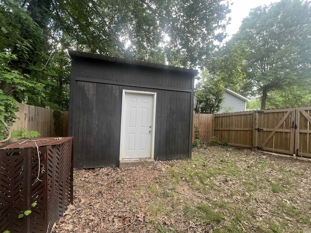 22 Irish Rose Cir, Alexander, AR 72002 - view of shed featuring a gate and a fenced backyard