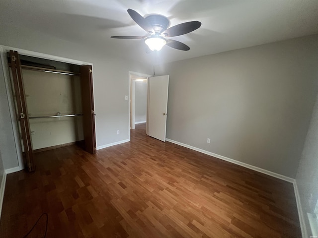 22 Irish Rose Cir, Alexander, AR 72002 - unfurnished bedroom with wood finished floors, baseboards, a closet, and a ceiling fan