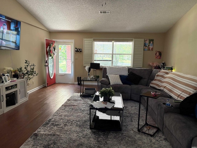 301 Halteria Ln Unit A, B, C, D, E, Hot Springs, AR 71913 - living area with wood finished floors, visible vents, vaulted ceiling, baseboards, and a textured ceiling