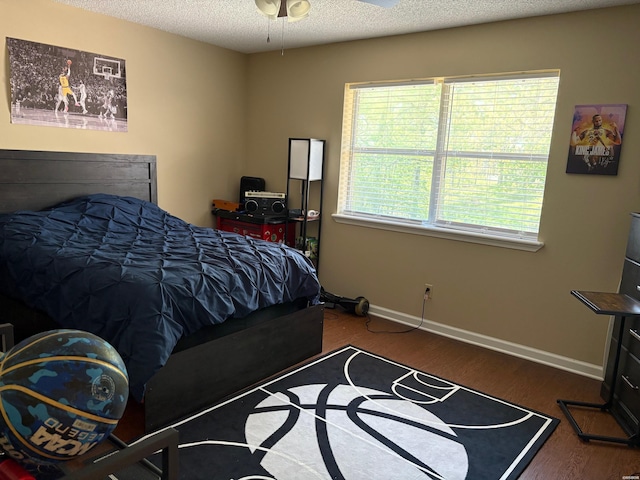 301 Halteria Ln Unit A, B, C, D, E, Hot Springs, AR 71913 - bedroom with wood finished floors, a textured ceiling, and baseboards
