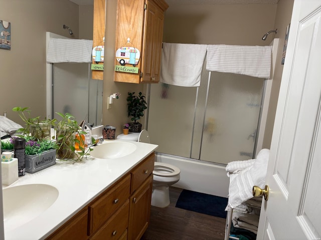 301 Halteria Ln Unit A, B, C, D, E, Hot Springs, AR 71913 - full bathroom featuring a sink, double vanity, toilet, wood finished floors, and enclosed tub / shower combo