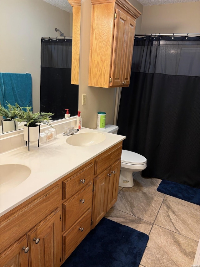 301 Halteria Ln Unit A, B, C, D, E, Hot Springs, AR 71913 - bathroom with double vanity, a textured ceiling, tile patterned flooring, and a sink